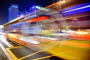 High speed and blurred bus light trails