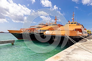 High-speed Cozumel ferry at the terminal of San Miguel de Cozumel waiting for passengers to Playa del Carmen and other photo