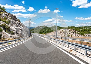 High-speed highway in mountainous terrain.