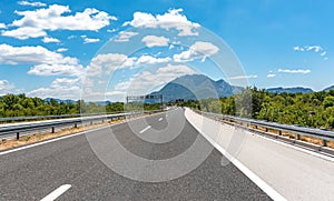 High-speed highway in mountainous terrain.
