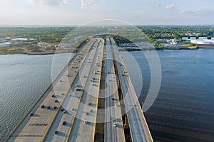 High-speed highway, with traffic road, the Alfred E. Driscoll Bridge across over the Raritan River. Aerial top view