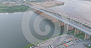 High-speed highway, with traffic road, the Alfred E. Driscoll Bridge across over the Raritan River. Aerial top view