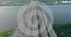 High-speed highway, with traffic road, the Alfred E. Driscoll Bridge across over the Raritan River. Aerial top view