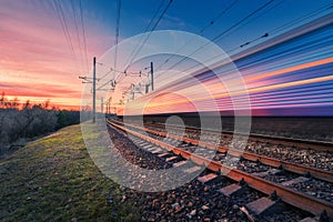 High speed passenger train in motion on railroad