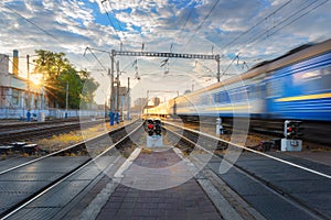 High speed passenger train in motion on railroad