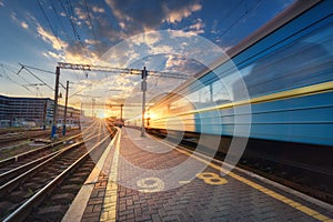 High speed passenger train in motion on railroad track