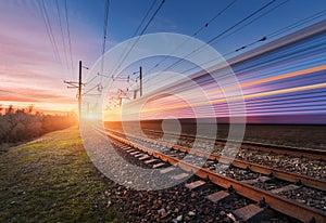 High speed passenger train in motion at sunset