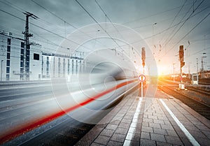 High speed passenger train on railroad track in motion