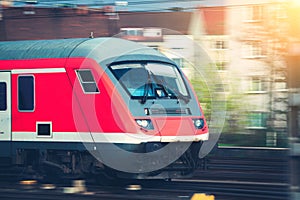 High speed passenger train on tracks in motion