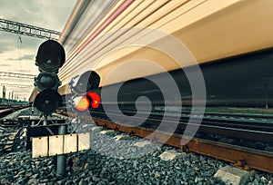 High speed passenger train on tracks with motion blur effect