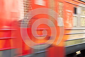 Motion blurred red train. Background
