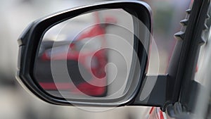 High speed run automobile in side view mirror car