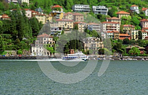High-speed sightseeing ship sails on Lake Como.