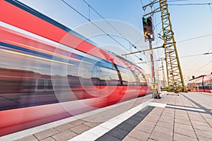 High speed train in motion on the railway station