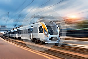 High speed train in motion at the railway station