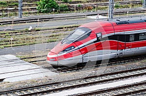 High-speed train on tracks photo
