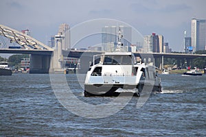 High speed waterbus over the river Lek which connects city of Rotterdam with Dordrecht