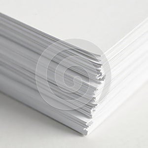 A high stack of blank white papers, close up view, lofty, macro