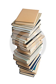 High stack of different books