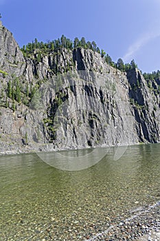 High steep rocky bank of a river