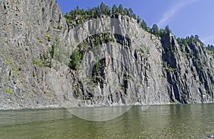 High steep rocky bank of a river