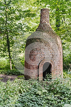 High stone-made oven with a chimney