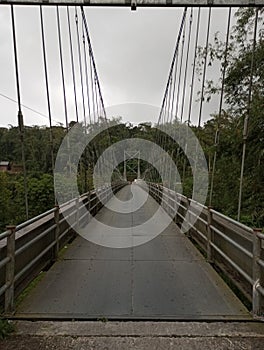 A high stretching bridge connects two villages photo