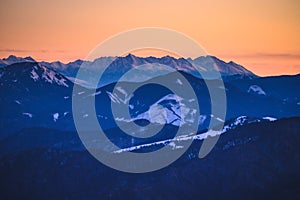 High Tatras panorama. Photo from Hill Krizna in slovakian mountains Velka Fatra. Sunrise light