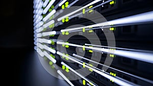 High-tech server rack with glowing green network cables in data center