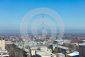 High telecommunicating tower in the centre of the city