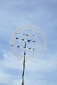 High television antenna old and obsolete technology on sky background