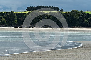 High tide coming at Pointe du Muret, Trecelin (France)