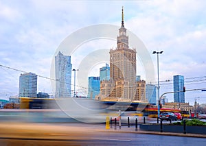High traffic near the Palace of Culture and Science in Warsaw, Poland. Long exposure shot of city life. Business center