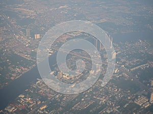 High view from airplane of dusty view, PM 2.5 in the air, pollution in Bangkok city
