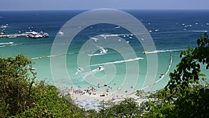 High view look down to the beach on sunny day can see speed boat move around Koh Lan Island, Thailand