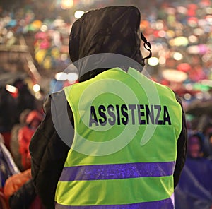high visibility jacket and  text ASSISTENZA that means Assistanc photo