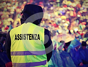 High visibility jacket and  text ASSISTENZA that means Assistanc photo