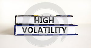 High volatility symbol. Concept words High volatility on beautiful books. Beautiful white table white background. Business high