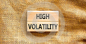 High volatility symbol. Concept words High volatility on beautiful wooden blocks. Beautiful canvas table canvas background.