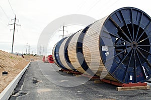 High voltage cable reels and road construction photo