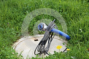 High voltage cable sticks out of the ground