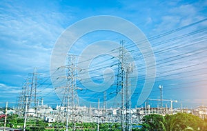 High voltage electric tower line. Silhouette of Power Supply Facilities with blue sky background