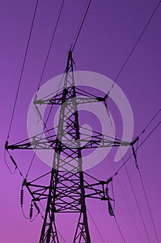 High voltage electric tower silhouette on bright purple background