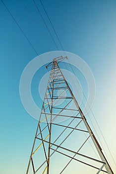 High voltage electricity pylon with wires, low wide angle view