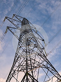 A high voltage electricity transmission pylon - part of the national grid for the distribution of power by overhead cables