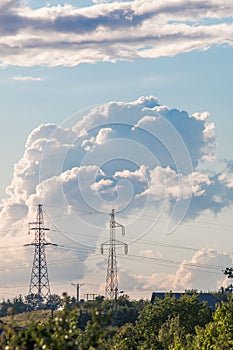 High-voltage line on a background of clouds