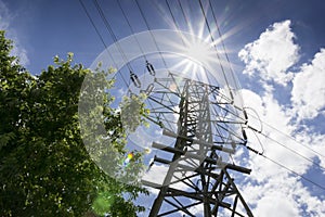 High Voltage Lines and Bright Sun Illustrate Summe