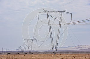 High voltage lines and power pylons