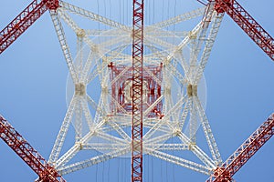 High voltage metallic tower nadir plan with white and red paint with cloudless