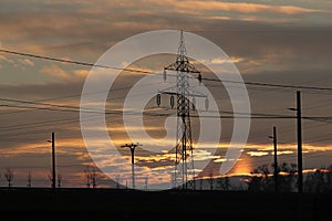 High voltage pole. Electrical distribution network. Infrastructure.